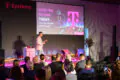 Speaker auf Bühne beim T-Systems Sommerfest 2025