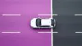 abstract white car rides on the road with markings purple or lilac background top view